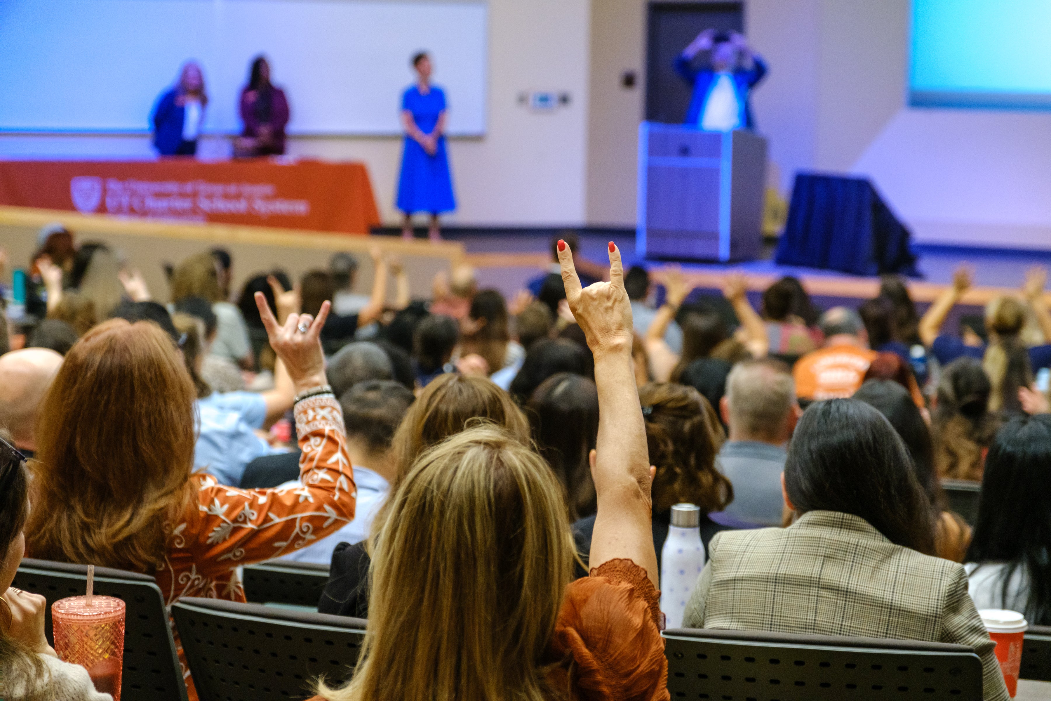 Auditorium of teachers, giving the Hook 'Em