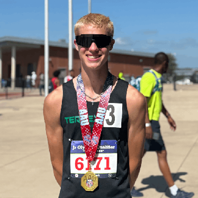 Gavin Matias wearing gold medal