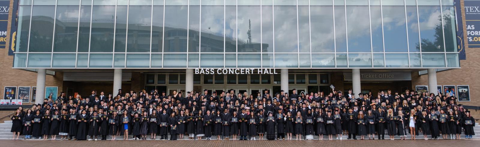 Group shot of the 2026 UT High School Graduating class in front of Bass Concert Hall