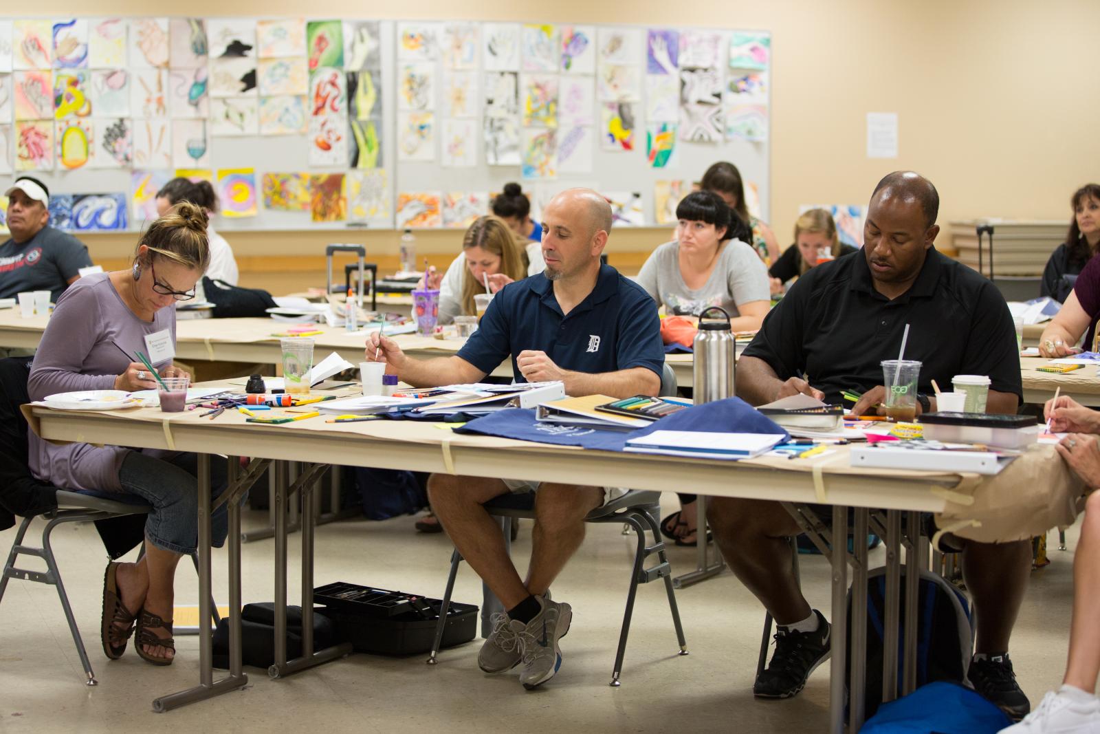 Art Teachers Working at Table 