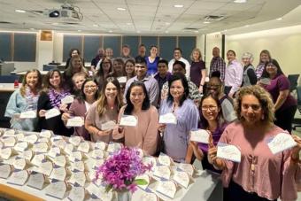 UTHS Staff wearing purple to honor military kids.