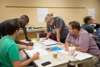 Teachers discussing information