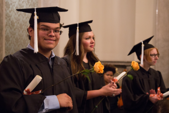 Graduates with roses