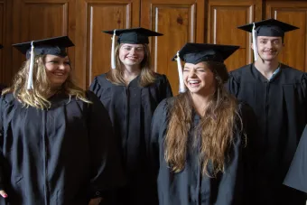 Graduates laughing