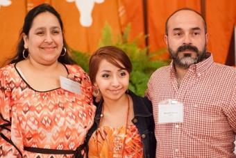 UT High School student and her parents all dress in orange to show school pride