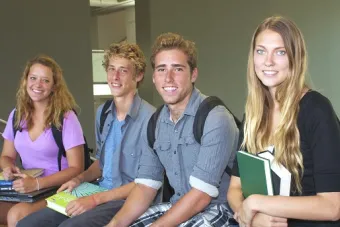 Students study together in a UT campus building