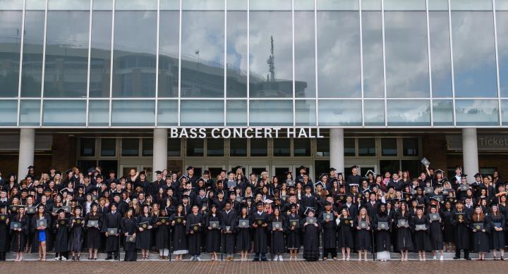 Group shot of the 2026 UT High School Graduating class in front of Bass Concert Hall